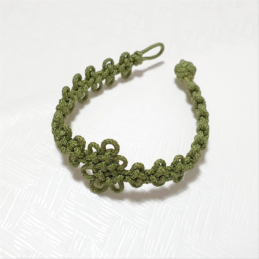 a chrysanthemum knot bracelet